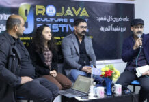 Panel sur la langue kurde lors du 9ème Festival de la Culture et des Arts du Rojava Lors du 9ème Festival de la Culture et des Arts du Rojava, un panel intitulé "La grammaire kurde entre acceptation et critique" s'est tenu, marquant une étape importante dans la reconnaissance et la standardisation de la langue kurde.